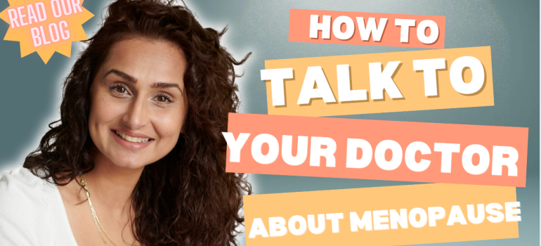 Woman with dark curls looking at the camera.