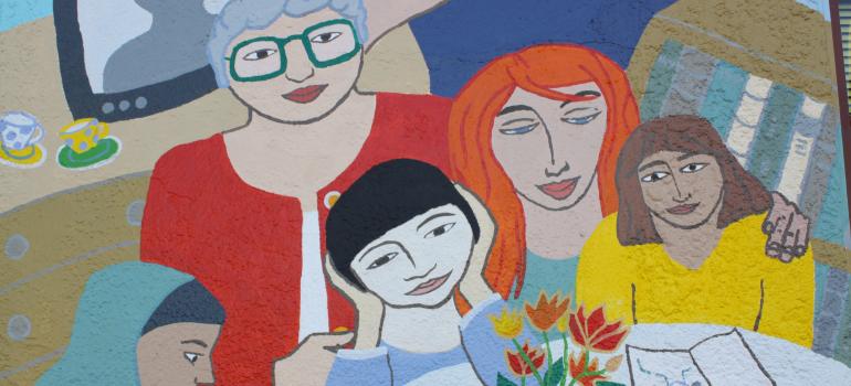 A colourful mural of women 